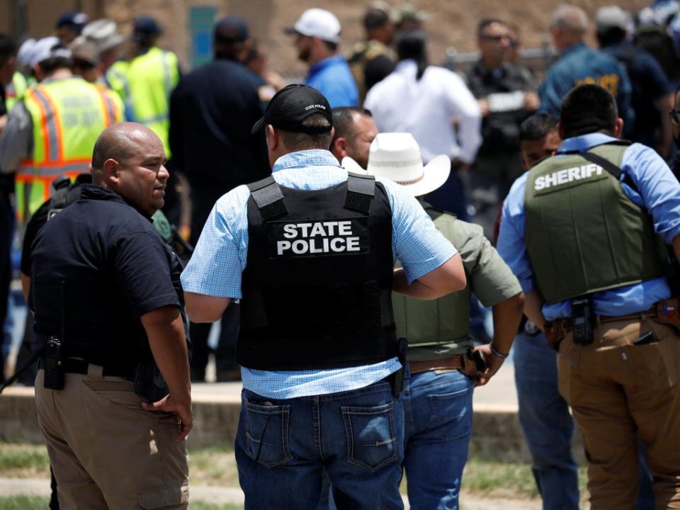 Law enforcement personnel guard the scene of a suspected shooting near Robb Elementary School in Uvalde, Texas, U.S. May 24, 2022 (REUTERS)