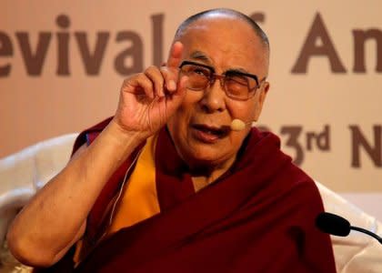 FILE PHOTO: Tibetan spiritual leader, the Dalai Lama, speaks at an interactive session organised by Indian Chamber of Commerce on