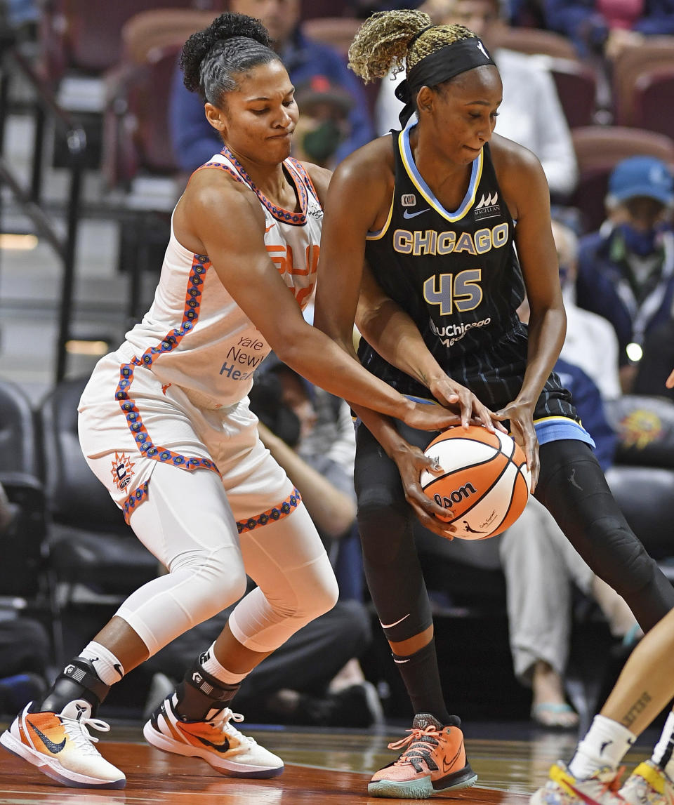 Connecticut Sun forward Alyssa Thomas pressures Chicago Sky forward Astou Ndour-Fall (45) during a WNBA semifinal playoff basketball game, Tuesday, Sept. 28, 2021, at Mohegan Sun Arena in Uncasville, Conn. (Sean D. Elliot/The Day via AP)