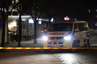 Police are seen in the area after several people were attacked in Vetlanda, Sweden, Wednesday, March 3, 2021. Swedish police say a man has assaulted at least eight people in a southern Sweden town, and that the case was being investigated as ”a suspected terrorist crime.” Police said a man in his 20s attacked people in the small town of Vetlanda, about 190 kilometers (118 miles) southeast of Goteborg, Sweden’s second largest city. (Mikael Fritzon/TT News Agency via AP)