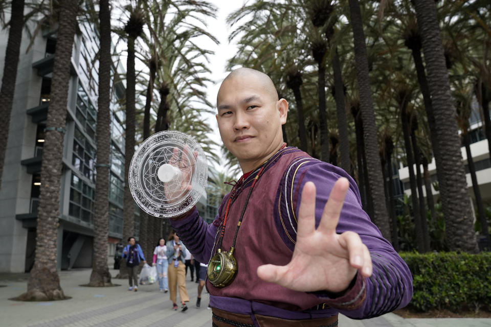 Jason Ho poses while dressed as Wong from Doctor Strange at the D23 Expo Saturday, Sept. 10, 2022, in Anaheim, Calif. (AP Photo/Mark J. Terrill)