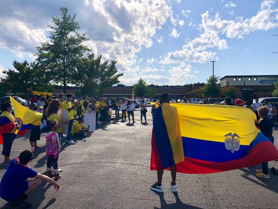 Around a hundred Colombians and other supporters gathered at Villa Latina plaza on Chapanoke Road in Raleigh on Saturday, May 8, 2021 in support of anti-government protests that have swept the South American country.