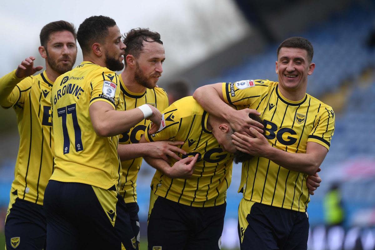 Oxford United players celebrate their fourth goal against Fleetwood Town <i>(Image: Mike Allen)</i>