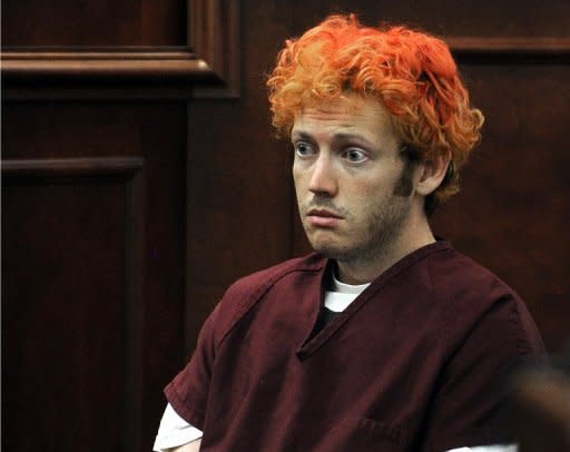 James Holmes appears in court at the Arapahoe County Justice Center July 23 in Centennial, Colorado. The suspected Batman massacre gunman was seeing a psychiatrist specializing in schizophrenia before the attack that killed 12 in Colorado, court documents showed Friday