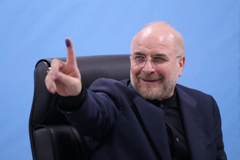 Speaker of the Iranian Parliament Mohammad Bagher Ghalibaf shows his ink finger to the media as he registers his candidacy for Iran's upcoming presidential election. Rouzbeh Fouladi/ZUMA Press Wire/dpa