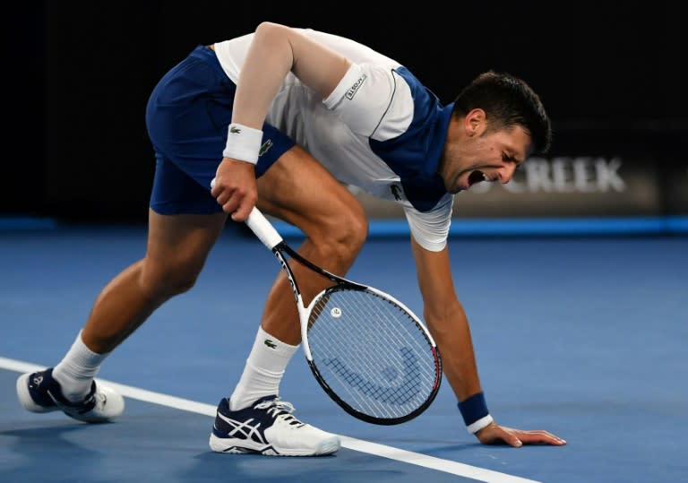 Pain barrier: Novak Djokovic is believed to have travelled to the Czech Republic for the procedure on his elbow