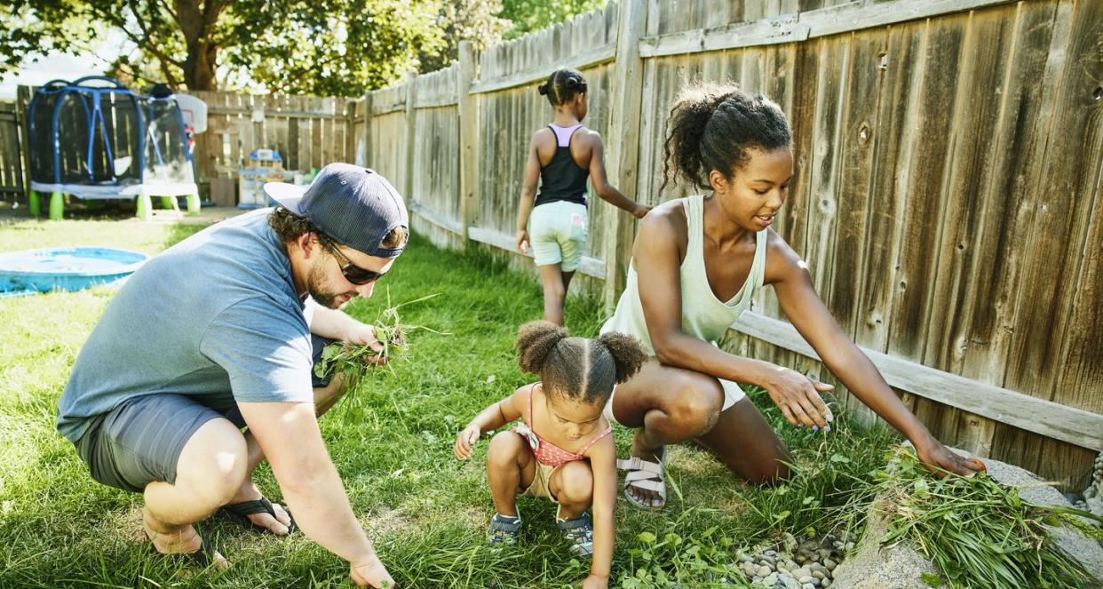 <span class="caption">Family stability can benefit a whole household.</span> <span class="attribution"><a class="link " href="https://www.gettyimages.com/detail/photo/family-pulling-weeds-in-backyard-garden-on-summer-royalty-free-image/1289136070" rel="nofollow noopener" target="_blank" data-ylk="slk:Thomas Barwick/DigitalVision via Getty Images;elm:context_link;itc:0;sec:content-canvas">Thomas Barwick/DigitalVision via Getty Images</a></span>