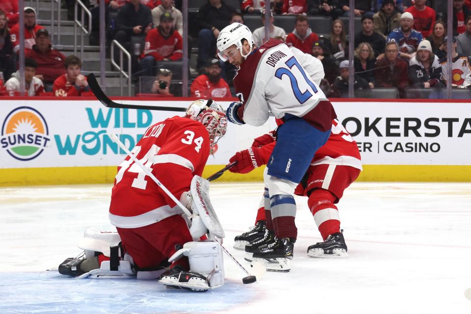 Alex Lyon of the Detroit Red Wings makes a first-period save on Jonathan Drouin of the Colorado Avalanche at Little Caesars Arena on Thursday, Feb. 22, 2024, in Detroit, Michigan.