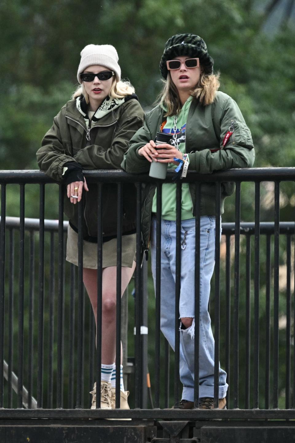 Cara Delevingne and US British actress Anya Taylor-Joy at Glastonbury (AFP via Getty Images)