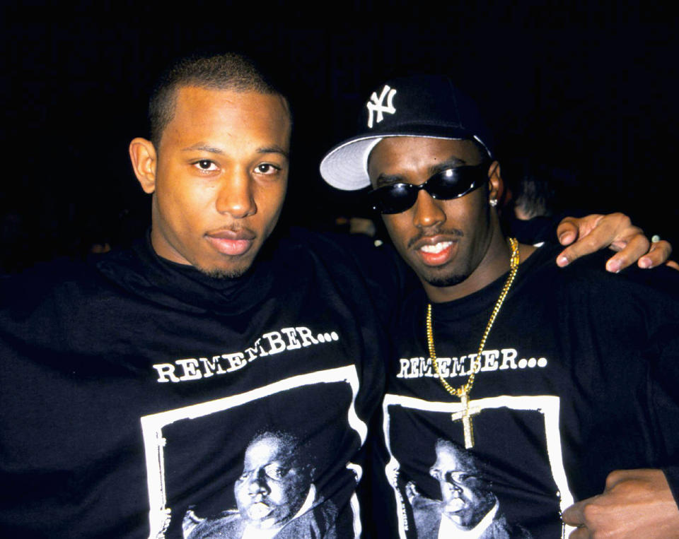 Shyne with Combs at the 1998 Grammys. In 1999, they were involved in a club shooting that landed Shyne in prison for 10 years. “I took the fall for my friends,” he says. “But that’s the way life is.” - Credit: Arnaldo Magnani/Getty Images