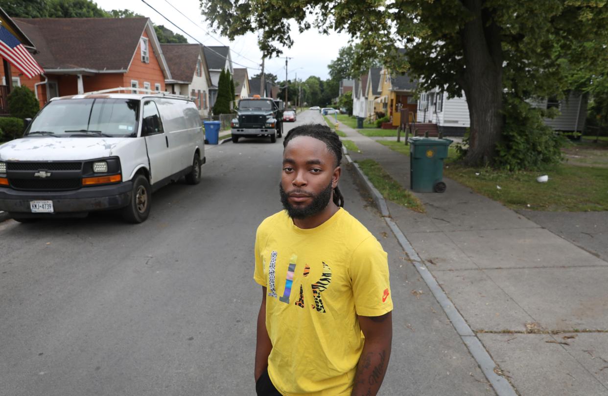 Marvin Taylor, 22, stands on Dale Street near the intersection with Joseph Avenue, near where he was pulled from his car and arrested by Rochester police on May 7, 2024.