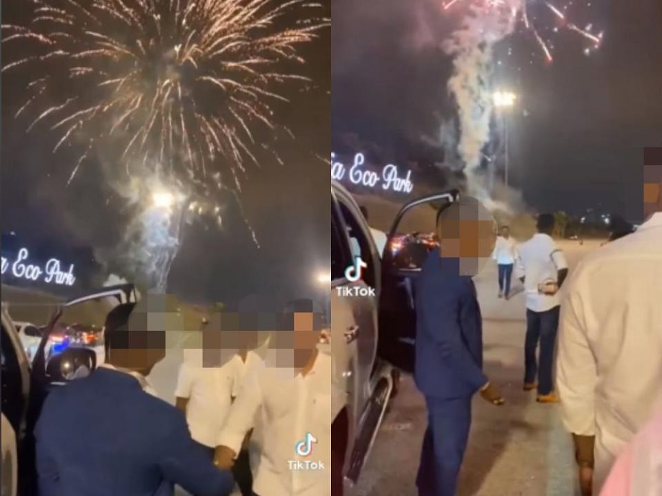 A group of sharply dressed men was seen burning fireworks by the roadside of Setia Alam’s toll plaza. — Screen capture via Facebook/ Traffic Info Crew