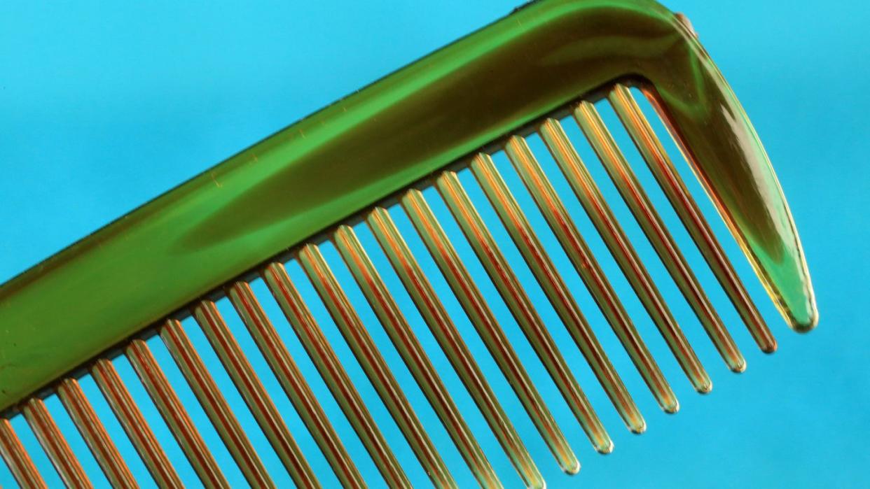 close up of a hair grooming comb