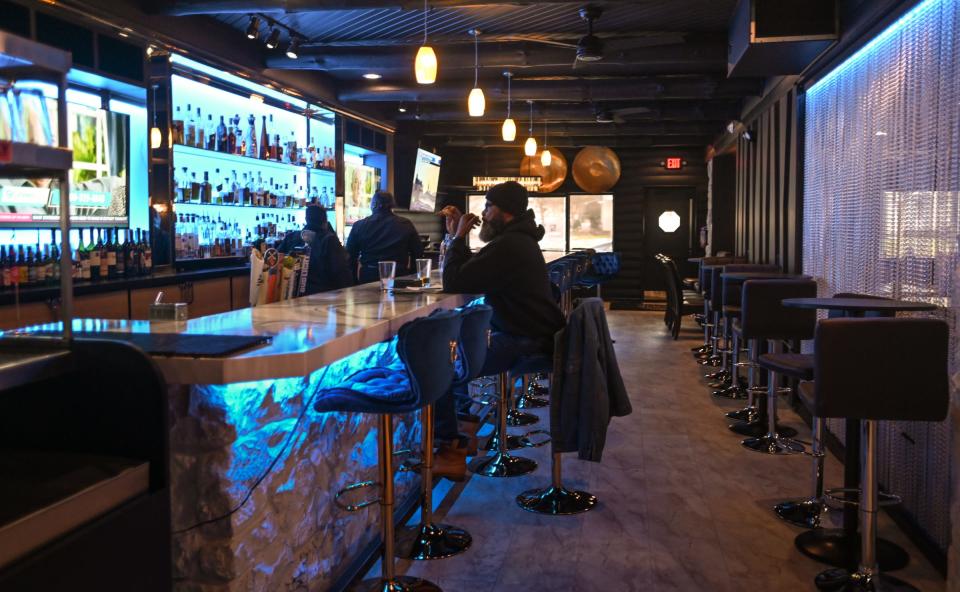 A peek inside the Comfort Zone Cigar Lounge & Bistro in Lansing, pictured Wednesday, Nov. 29, 2023.