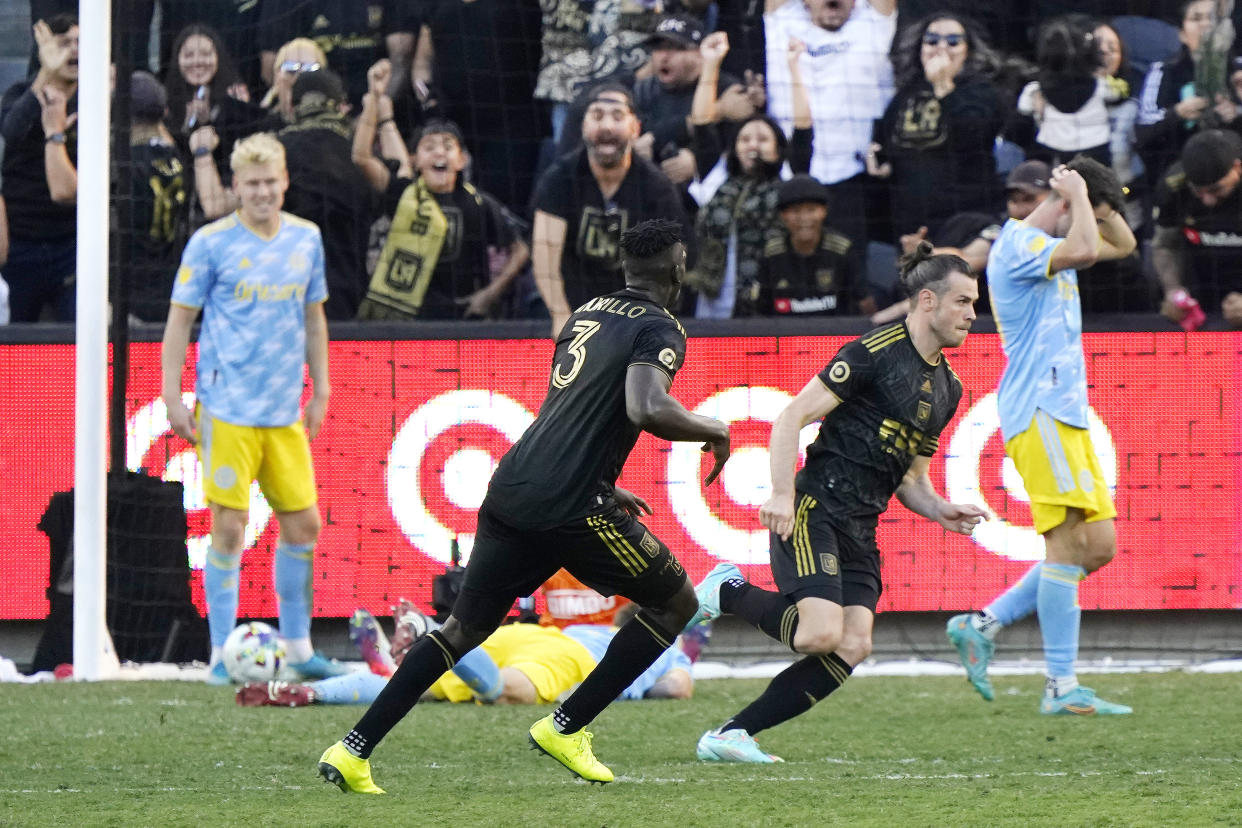 Los Angeles FC forward Gareth Bale, second from right, celebrates after scoring the equalizing goal against the Philadelphia Union during overtime in the MLS Cup soccer match Saturday, Nov. 5, 2022, in Los Angeles. (AP Photo/Marcio Jose Sanchez)