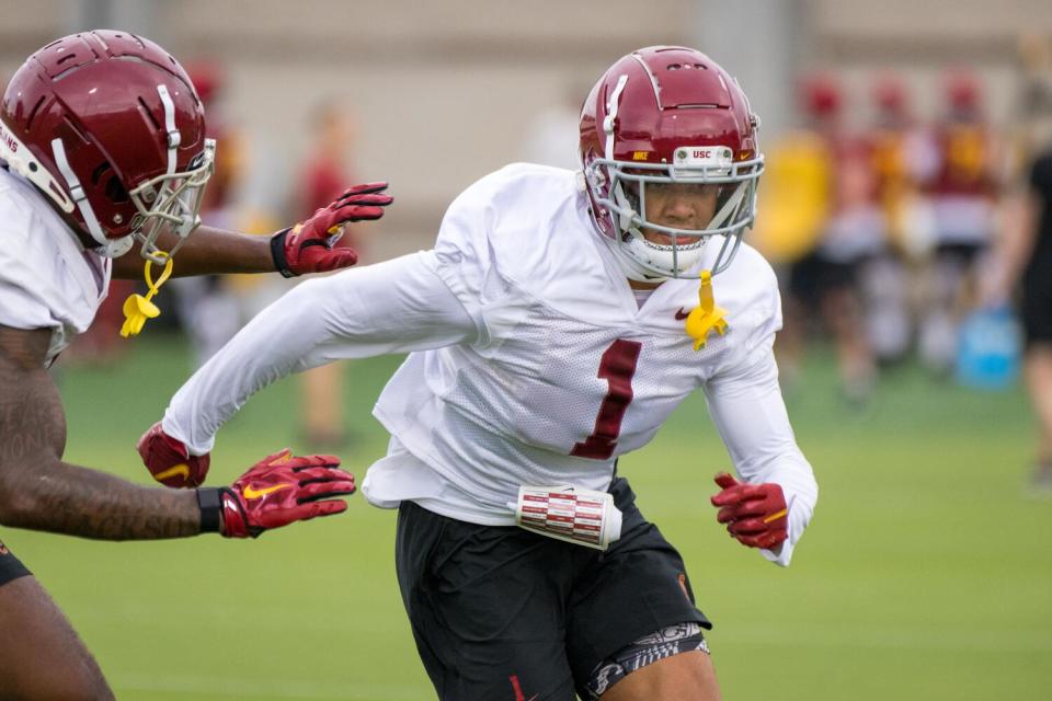 USC defensive back Domani Jackson runs a drill at practice in August 2022.