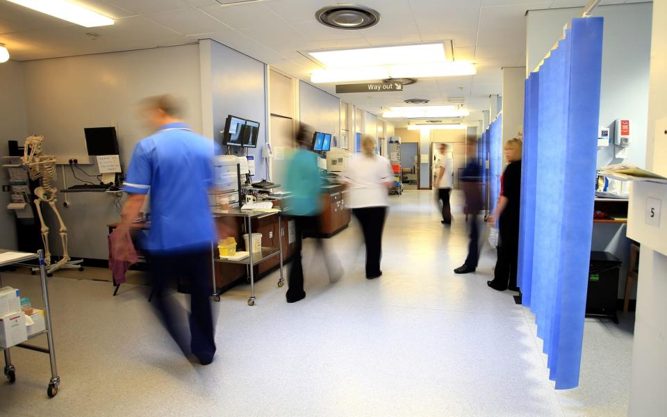 Staff on a NHS hospital ward - PETER BYRNE/PA WIRE