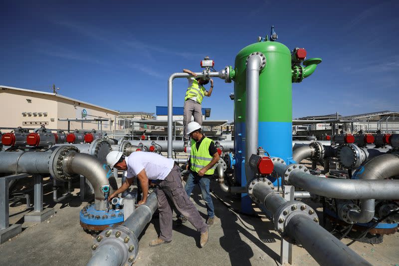 Employees work at Augwind's commercial facility in Kibbutz Yahel, Israel