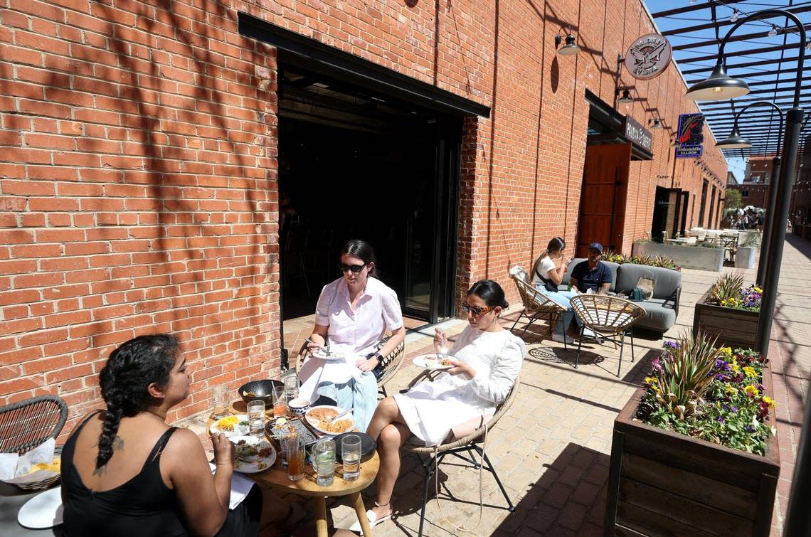 Diners enjoy lunch on Paloma Suerte’s outdoor patio on Sunday, March 20, 2022.