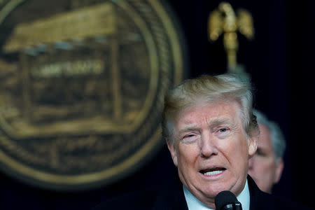 FILE PHOTO: U.S. President Donald Trump speaks to the media at Camp David, Maryland, U.S., January 6, 2018. REUTERS/Yuri Gripas