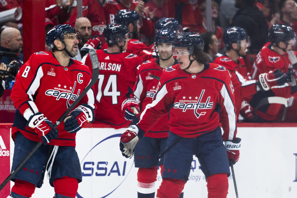 Washington Capitals left wing Sonny Milano (15) skates with left wing Alex Ovechkin (8) after scoring a goal on Ovechkin's assist during the second period of an NHL hockey game against the Arizona Coyotes, Sunday, March 3, 2024, in Washington. (AP Photo/Manuel Balce Ceneta)