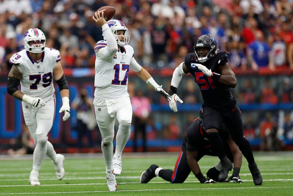 HOUSTON, TEXAS - OCTOBER 06: Josh Allen #17 of the Buffalo Bills scrambles during the third quarter against the Houston Texans at NRG Stadium on October 06, 2024 in Houston, Texas. (Photo by Tim Warner/Getty Images)