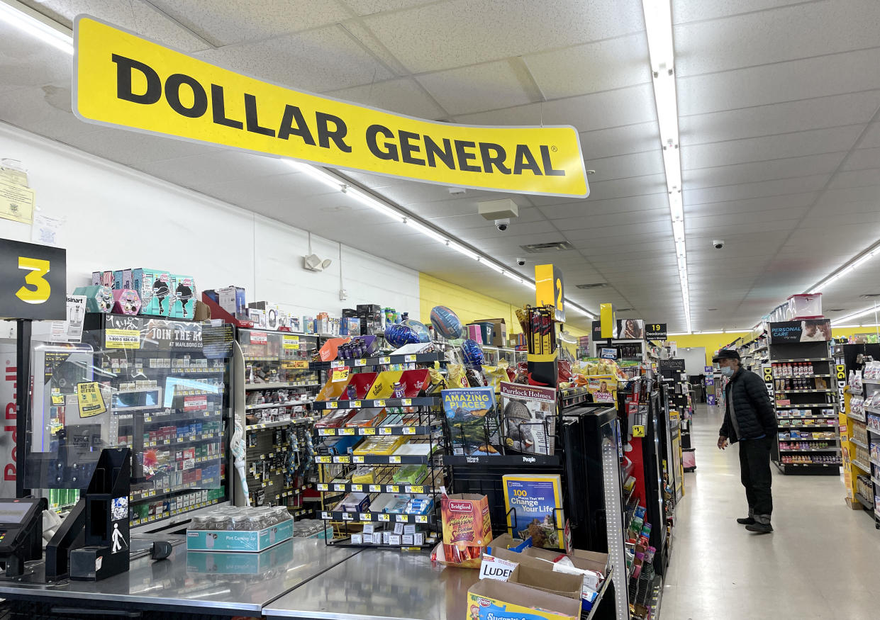 VALLEJO, CALIFORNIA - MARCH 17: A customer shops at a Dollar General store on March 17, 2022 in Vallejo, California. Dollar General announced fourth quarter earnings of $2.57 per share, just beating analyst expectations of $2.56 per share. The retailer had net income of $597.4 million, down from $642.7 million one year ago. (Photo by Justin Sullivan/Getty Images)