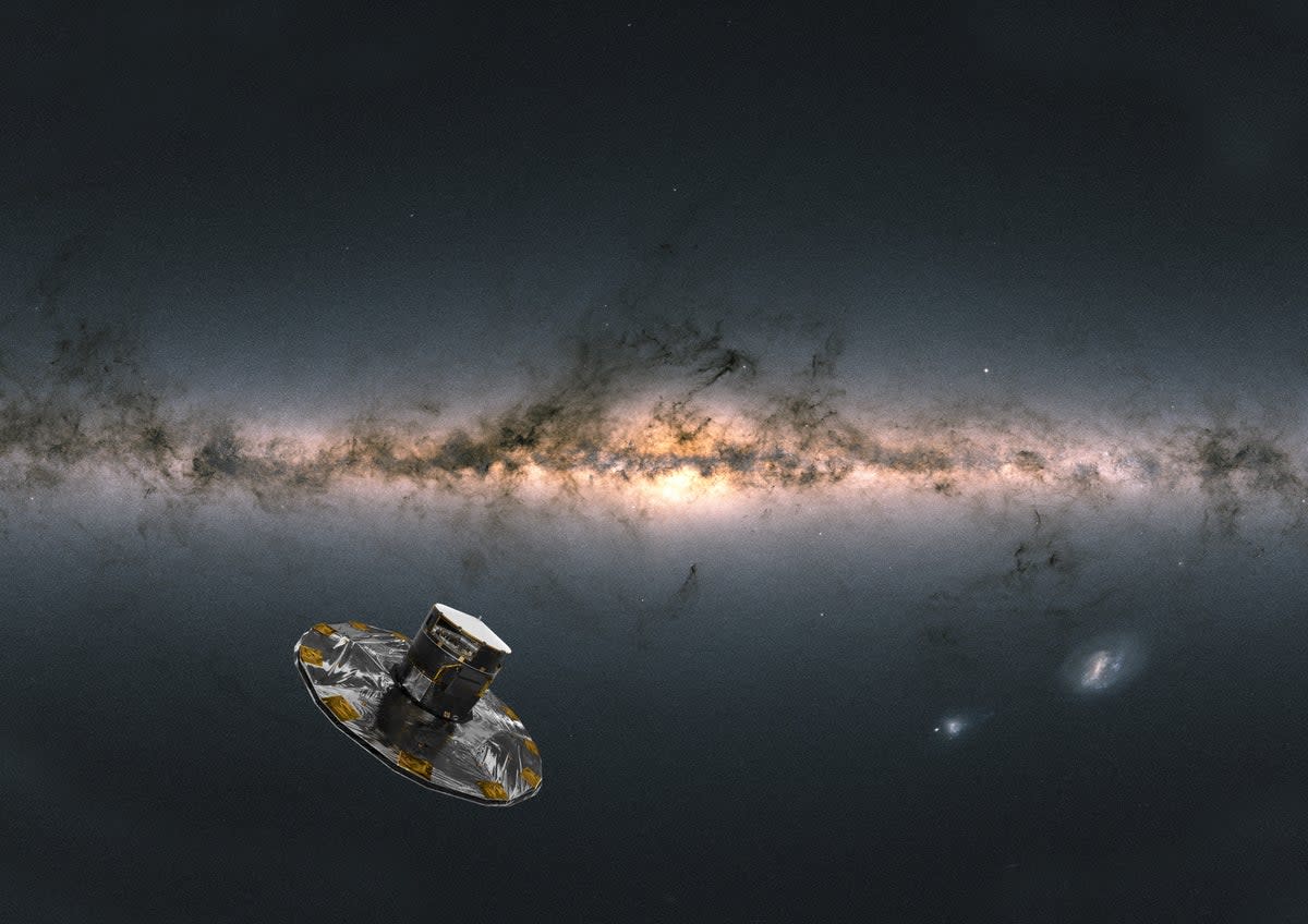 An artist’s conception of the European Space Agency’s Gaia space telescope observing the galaxy (Esa)