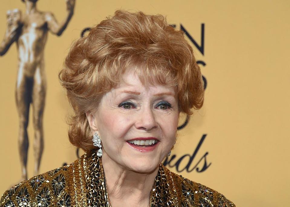 los angeles, ca january 25 actress debbie reynolds, recipient of the screen actors guild life achievement award, poses in the press room during the 21st annual screen actors guild awards at the shrine auditorium on january 25, 2015 in los angeles, california photo by ethan millergetty images