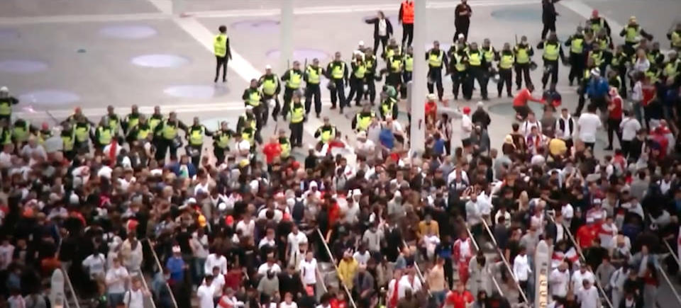 England fans breaking past police at the Euro 2020 final