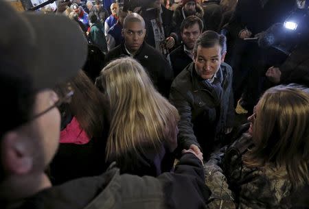 U.S. Republican presidential candidate Ted Cruz greets attendees at a campaign event in Osceola, Iowa, United States, January 26, 2016. REUTERS/Jim Young