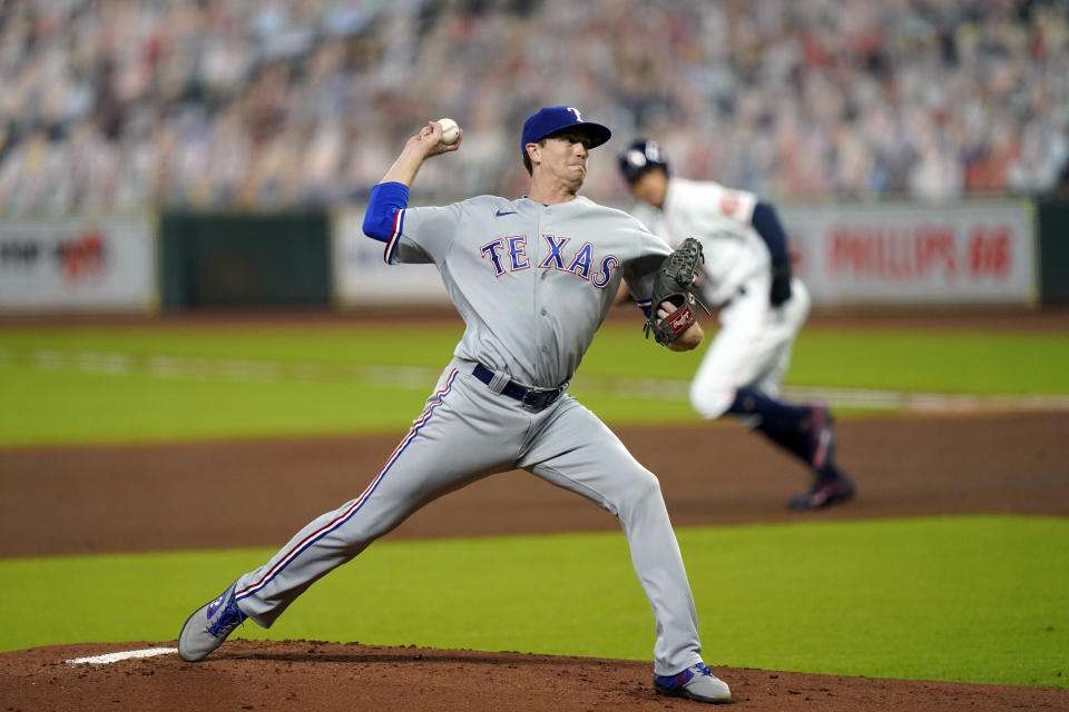 Texas Rangers starting pitcher Kyle Gibson throws against the Houston Astros during the first inning of a baseball game Wednesday, Sept. 16, 2020, in Houston. (AP Photo/David J. Phillip)