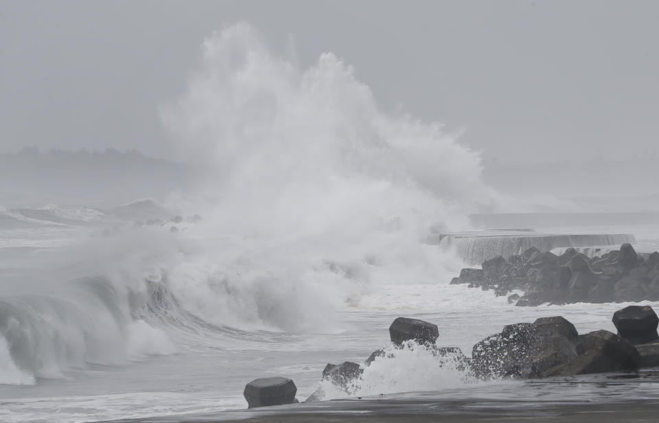 Large waves crash against the breakwaters as Typhoon Mawar approaches to Taiwan in Yilan County, eastern coast of Taiwan, Tuesday, May 30, 2023. Typhoon Mawar lashed Taiwan's eastern coast on Tuesday with wind, rains and large waves but largely skirted the island after giving a glancing blow to the northern Philippines. (AP Photo/Chiang Ying-ying)