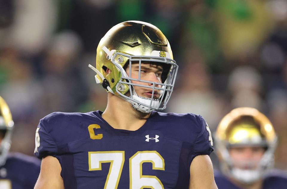 SOUTH BEND, INDIANA – OCTOBER 14: Joe Alt #76 of the Notre Dame Fighting Irish looks on against the USC Trojans during the first half at Notre Dame Stadium on October 14, 2023 in South Bend, Indiana. (Photo by Michael Reaves/Getty Images)