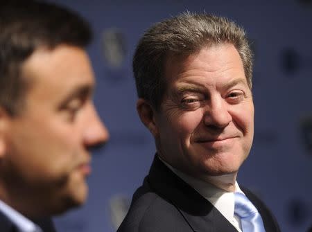 Kansas Governor Sam Brownback announces the development of a U.S. National soccer training center complex during a news conference in Kansas City, Kansas July 23, 2014. REUTERS/Dave Kaup