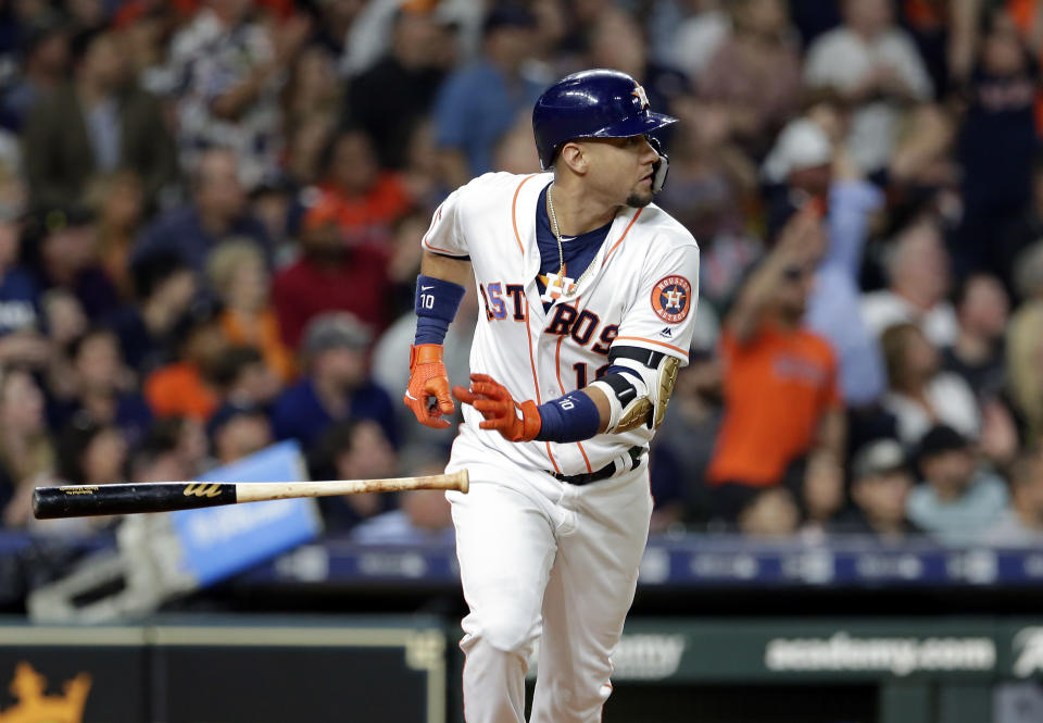 Houston Astros' Yuli Gurriel flips his bat as he rounds the bases on his two-run home run during the fifth inning of a baseball game Wednesday, Sept. 18, 2019, in Houston. (AP Photo/Michael Wyke)