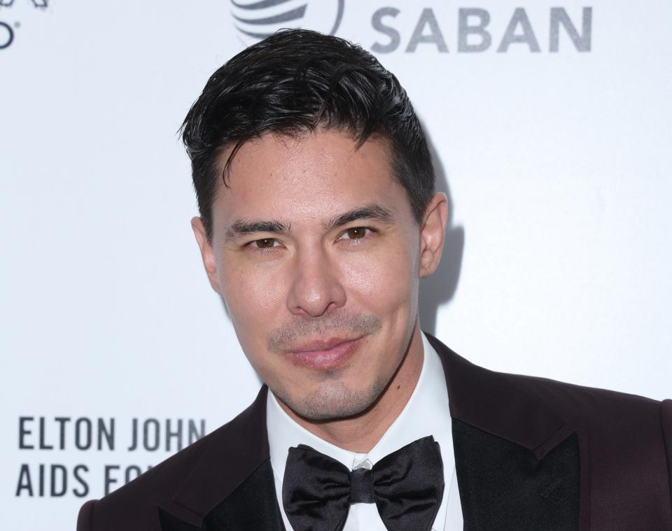Lewis Tan attends a foundation event