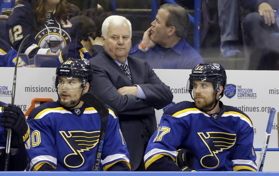 FILE - In this May 17, 2016 file photo, St. Louis Blues head coach Ken Hitchcock watches during the second period in Game 2 of the NHL hockey Stanley Cup Western Conference finals against the San Jose Sharks in St. Louis. The Blues have fired Hitchcock. Assistant and coach-in-waiting Mike Yeo replaced him. General manager Doug Armstrong announced the change Wednesday, Feb. 1, 2017. (AP Photo/Jeff Roberson)