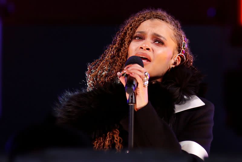 FILE PHOTO: Day performs in Times Square on New Years Eve in New York City