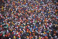 <p>Indian Sikh devotees pay respects on the first day of the year at the Golden Temple in Amritsar on January 1, 2016. </p>