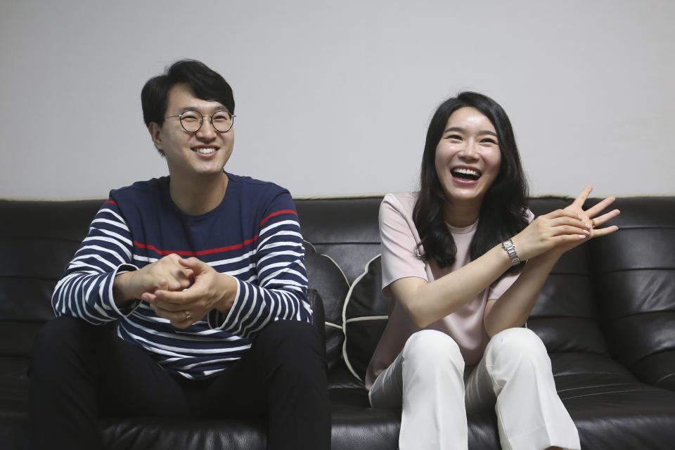 North Korean refugee Kim Seo-yun and her South Korean husband Lee Jeong-sup smile during an interview at their house in Seoul, South Korea Thursday, July 23, 2020. Tens of thousands of North Koreans, mostly women, have fled to South Korea over the past two decades. Arriving from a nominally socialist, extremely repressive society, these women often struggle to adjust to fast-paced, capitalistic lives in South Korea. They also face widespread discrimination, bias and loneliness. Many want to marry South Korean men, who they think will help them better adjust to new lives in South Korea. The number of these North-South Korean couples appears to be on the rise, according to at least one government survey. (AP Photo/Ahn Young-joon)