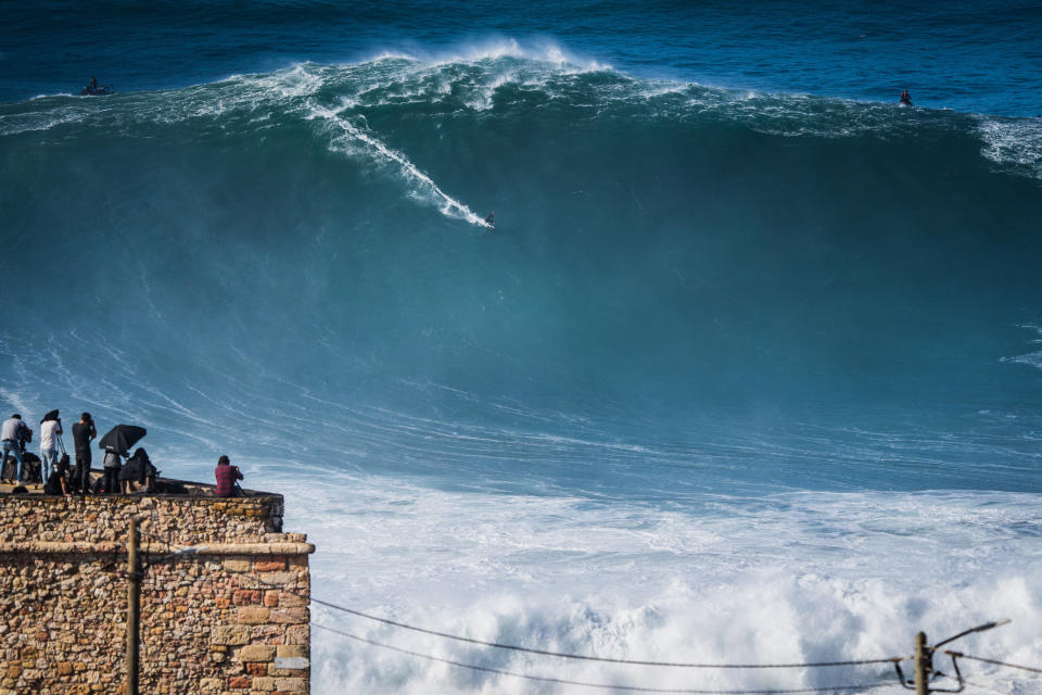 NAZARE, PORTUGAL - 2020/10/29: Big wave surfer Sebastian Steudtner from Germany rides a wave during a tow surfing session at Praia do Norte on the first big swell of winter season. (Photo by Henrique Casinhas/SOPA Images/LightRocket via Getty Images)