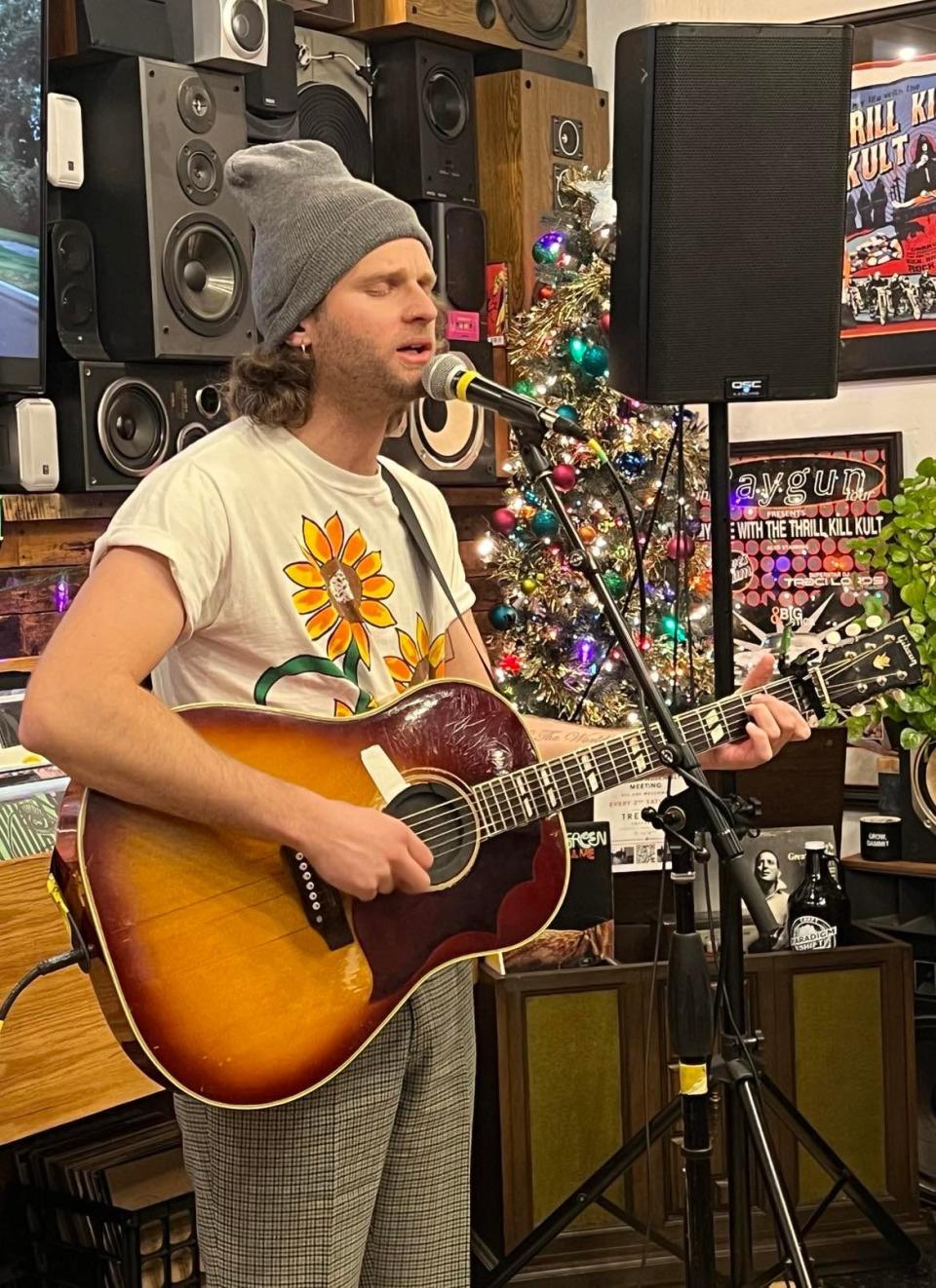 Indie rock singer songwriter Joe P performs earlier this month at Erie St Vinyl in downtown Massillon, where he was signing copies of his debut EP, "Emily Can't Sing." The New Jersey resident released a second EP in 2022, "French Blonde."