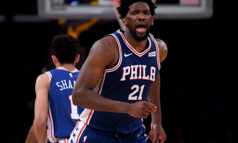 joel embiid yells during an nba game