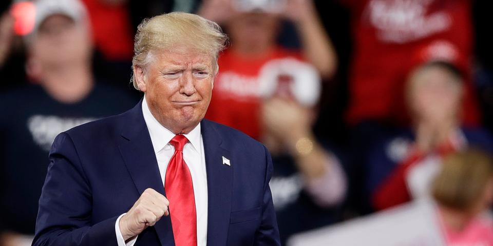 President Donald Trump gestures as he arrives at a campaign rally in Hershey, Pa., Tuesday, Dec. 10, 2019. (AP Photo/Matt Rourke)