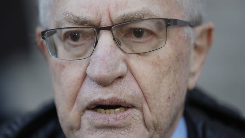 In this March 6, 2019, file photo, attorney Alan Dershowitz speaks during a news interview outside of Manhattan Federal Court in New York.