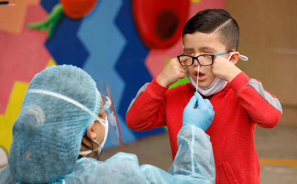 Kindergarten student Matteo Rodriguez gets a Covid-19 test in California (Al Seib / Los Angeles Times via Getty Images)