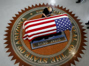 <p>Meghan McCain, daughter of, Sen. John McCain, R-Ariz., touches the casket during a memorial service at the Arizona Capitol on Wednesday, Aug. 29, 2018, in Phoenix. (Photo/Ross D. Franklin, Pool/AP) </p>