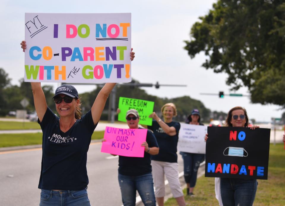 Moms for Liberty held an anti-mask rally before a May 2021 school board meeting, asking the school board to drop their mask mandate. A fairly large group of parents, students and concerned citizens showed up before the meeting to wave signs at passing cars.