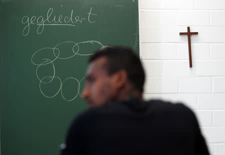 A student sits in a classroom of the Europa-Berufsschule vocational school in Weiden, Germany, September 25, 2018. Picture taken September 25, 2018. REUTERS/Michael Dalder